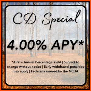 An Autumn background with a sign talking about interest rates.